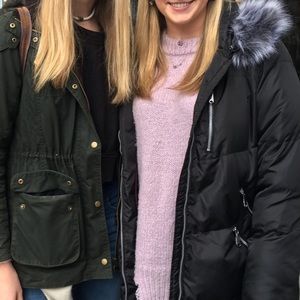 Puffy jacket with firm trim hood